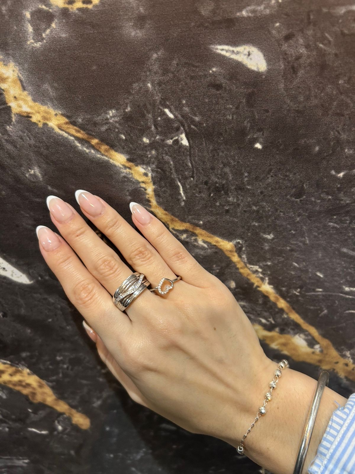 Anillos y pulsera de plata
